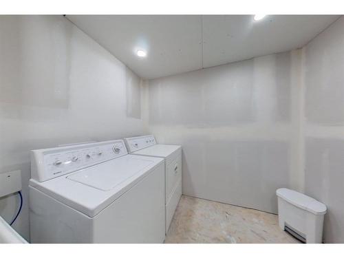 66 Erin Crescent Se, Calgary, AB - Indoor Photo Showing Laundry Room