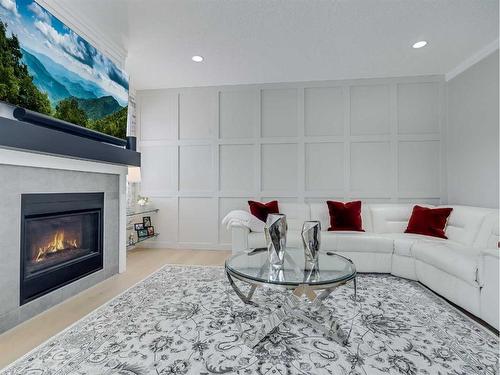 6 Cranbrook Circle Se, Calgary, AB - Indoor Photo Showing Living Room With Fireplace