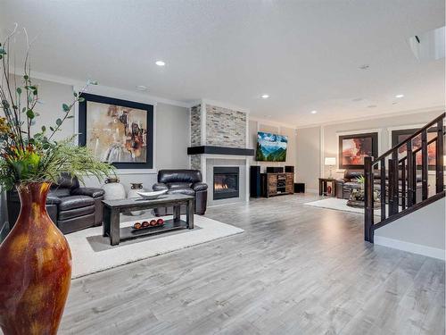 6 Cranbrook Circle Se, Calgary, AB - Indoor Photo Showing Other Room With Fireplace