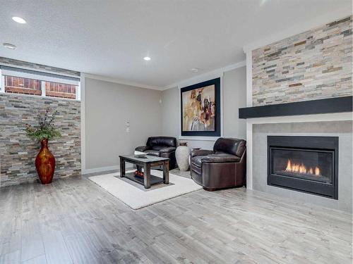 6 Cranbrook Circle Se, Calgary, AB - Indoor Photo Showing Living Room With Fireplace