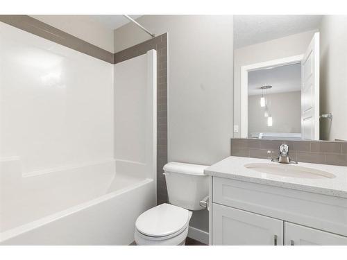 128 Heartland Boulevard, Cochrane, AB - Indoor Photo Showing Bathroom