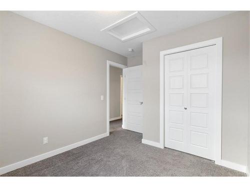 128 Heartland Boulevard, Cochrane, AB - Indoor Photo Showing Other Room