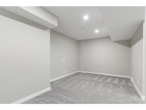 128 Heartland Boulevard, Cochrane, AB - Indoor Photo Showing Other Room