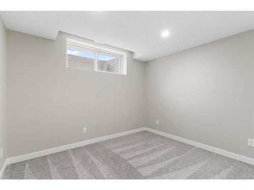 128 Heartland Boulevard, Cochrane, AB - Indoor Photo Showing Other Room