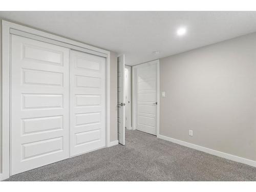 128 Heartland Boulevard, Cochrane, AB - Indoor Photo Showing Other Room