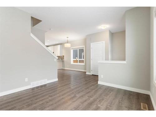 128 Heartland Boulevard, Cochrane, AB - Indoor Photo Showing Other Room