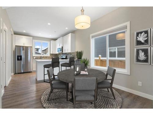 128 Heartland Boulevard, Cochrane, AB - Indoor Photo Showing Dining Room