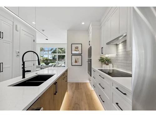 1423 Child Avenue Ne, Calgary, AB - Indoor Photo Showing Kitchen With Double Sink With Upgraded Kitchen