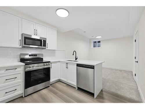 1423 Child Avenue Ne, Calgary, AB - Indoor Photo Showing Kitchen With Stainless Steel Kitchen