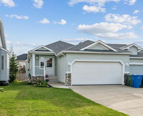 154 West Creek Bay, Chestermere, AB - Outdoor With Facade