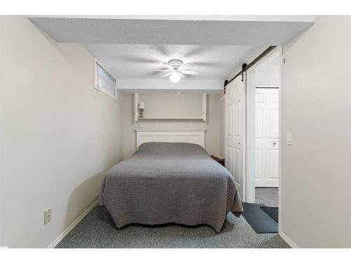 84 Glendale Way, Cochrane, AB - Indoor Photo Showing Bedroom