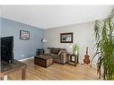 84 Glendale Way, Cochrane, AB  - Indoor Photo Showing Living Room 