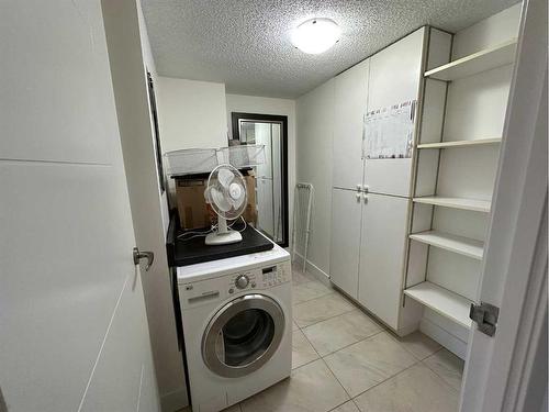 1509-738 3 Avenue Sw, Calgary, AB - Indoor Photo Showing Laundry Room