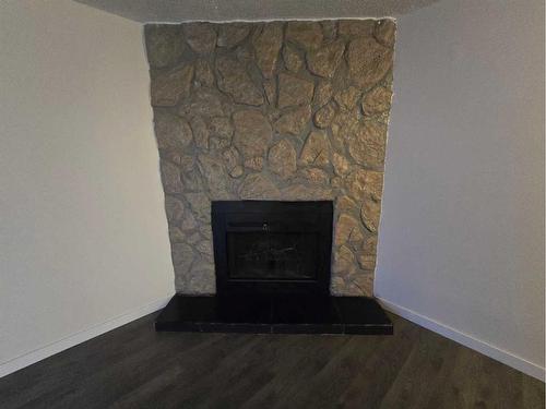 2928 Doverville Crescent Se, Calgary, AB - Indoor Photo Showing Living Room With Fireplace