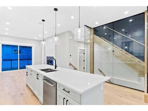 2019 21 Avenue Nw, Calgary, AB - Indoor Photo Showing Kitchen With Double Sink With Upgraded Kitchen