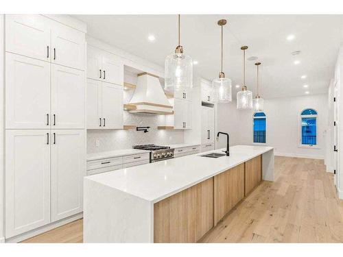 2019 21 Avenue Nw, Calgary, AB - Indoor Photo Showing Kitchen With Double Sink With Upgraded Kitchen