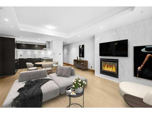 605-738 1 Avenue Sw, Calgary, AB - Indoor Photo Showing Living Room With Fireplace