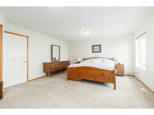 224 Tuscarora Heights Nw, Calgary, AB - Indoor Photo Showing Bedroom