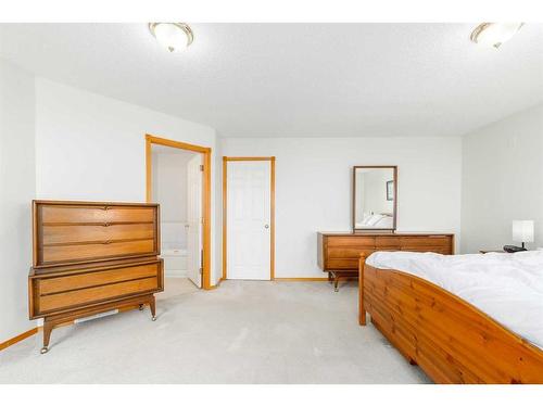 224 Tuscarora Heights Nw, Calgary, AB - Indoor Photo Showing Bedroom