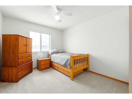 224 Tuscarora Heights Nw, Calgary, AB - Indoor Photo Showing Bedroom