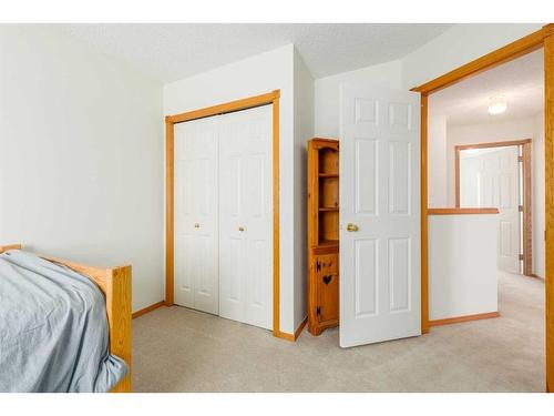 224 Tuscarora Heights Nw, Calgary, AB - Indoor Photo Showing Bedroom