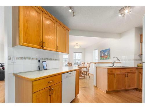 224 Tuscarora Heights Nw, Calgary, AB - Indoor Photo Showing Kitchen With Double Sink