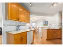 224 Tuscarora Heights Nw, Calgary, AB  - Indoor Photo Showing Kitchen With Double Sink 