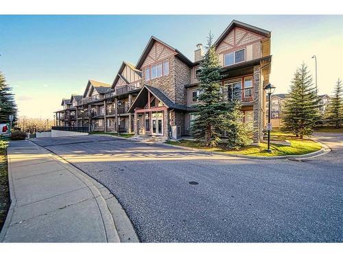 2101-211 Aspen Stone Boulevard Sw, Calgary, AB - Outdoor With Facade