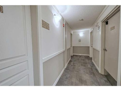 2101-211 Aspen Stone Boulevard Sw, Calgary, AB - Indoor Photo Showing Other Room