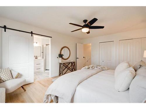 14 West Hall Place, Cochrane, AB - Indoor Photo Showing Bedroom