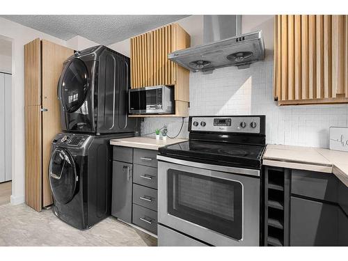 4504 14 Street Nw, Calgary, AB - Indoor Photo Showing Laundry Room