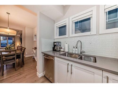 1-2420 30 Street Sw, Calgary, AB - Indoor Photo Showing Kitchen With Double Sink With Upgraded Kitchen