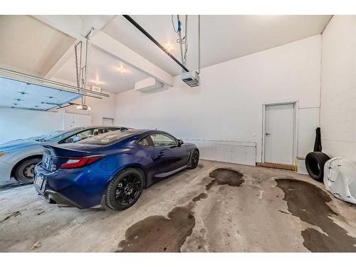 1-2420 30 Street Sw, Calgary, AB - Indoor Photo Showing Garage