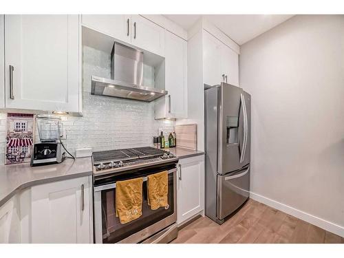 1-2420 30 Street Sw, Calgary, AB - Indoor Photo Showing Kitchen With Stainless Steel Kitchen