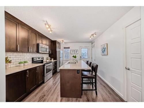 67 Cranford Way Se, Calgary, AB - Indoor Photo Showing Kitchen