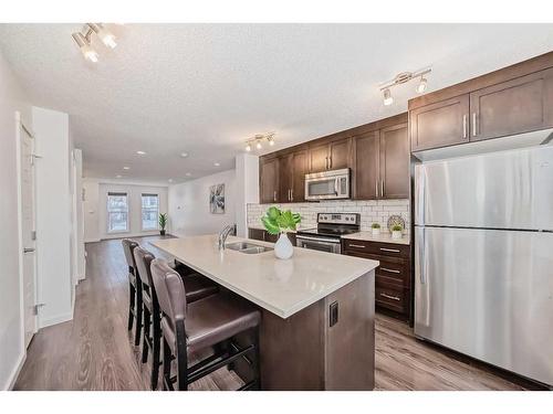 67 Cranford Way Se, Calgary, AB - Indoor Photo Showing Kitchen With Stainless Steel Kitchen