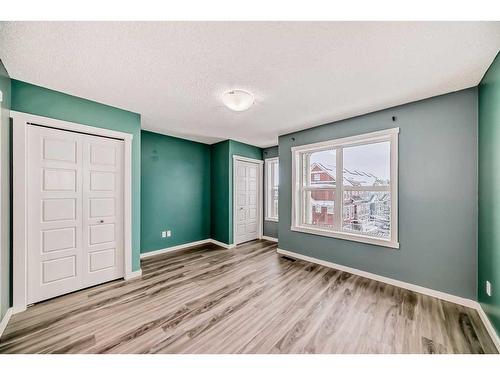 67 Cranford Way Se, Calgary, AB - Indoor Photo Showing Other Room