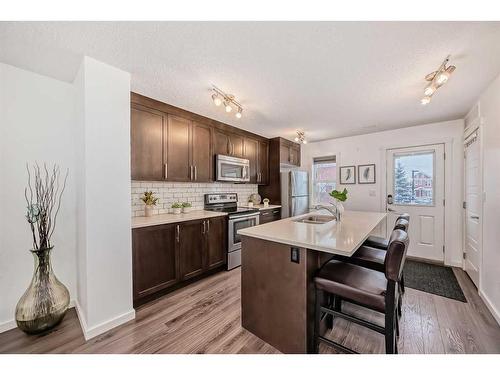 67 Cranford Way Se, Calgary, AB - Indoor Photo Showing Kitchen With Stainless Steel Kitchen