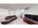 4002-1001 8 Street Nw, Airdrie, AB  - Indoor Photo Showing Living Room 