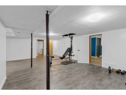 1311 Osler Street, Carstairs, AB - Indoor Photo Showing Gym Room