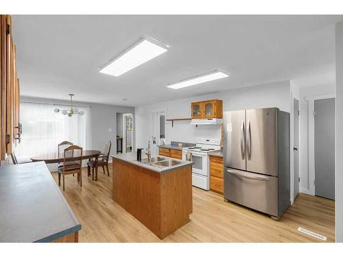 1311 Osler Street, Carstairs, AB - Indoor Photo Showing Kitchen With Double Sink