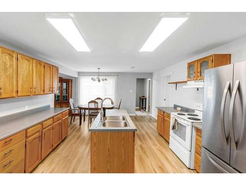 1311 Osler Street, Carstairs, AB - Indoor Photo Showing Kitchen With Double Sink