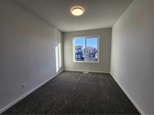 495 Lucas Boulevard Nw, Calgary, AB - Indoor Photo Showing Other Room