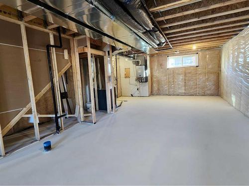 495 Lucas Boulevard Nw, Calgary, AB - Indoor Photo Showing Basement