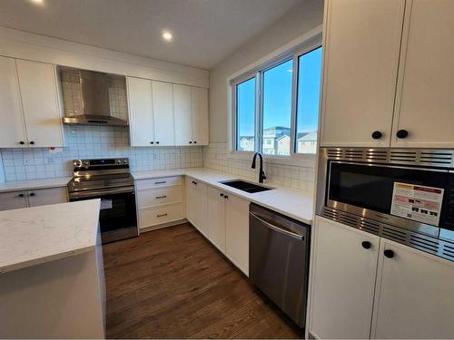 495 Lucas Boulevard Nw, Calgary, AB - Indoor Photo Showing Kitchen With Double Sink