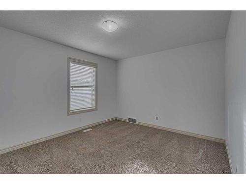 140 Kinlea Link Nw, Calgary, AB - Indoor Photo Showing Bedroom