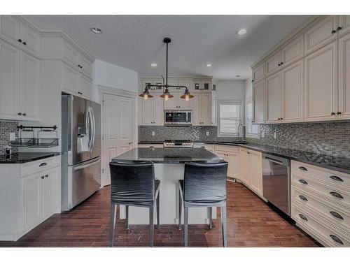 140 Kinlea Link Nw, Calgary, AB - Indoor Photo Showing Kitchen With Upgraded Kitchen