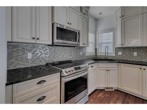 140 Kinlea Link Nw, Calgary, AB - Indoor Photo Showing Kitchen With Upgraded Kitchen