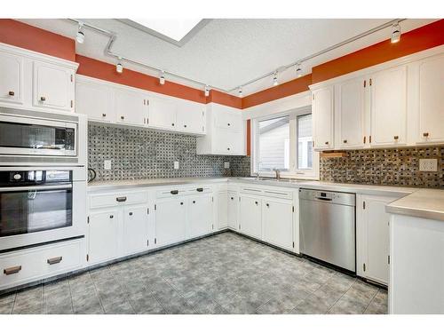 10832 Maplecreek Drive Se, Calgary, AB - Indoor Photo Showing Kitchen With Upgraded Kitchen