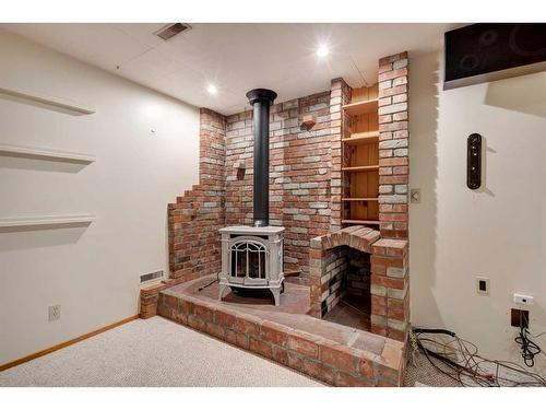 10832 Maplecreek Drive Se, Calgary, AB - Indoor Photo Showing Other Room With Fireplace